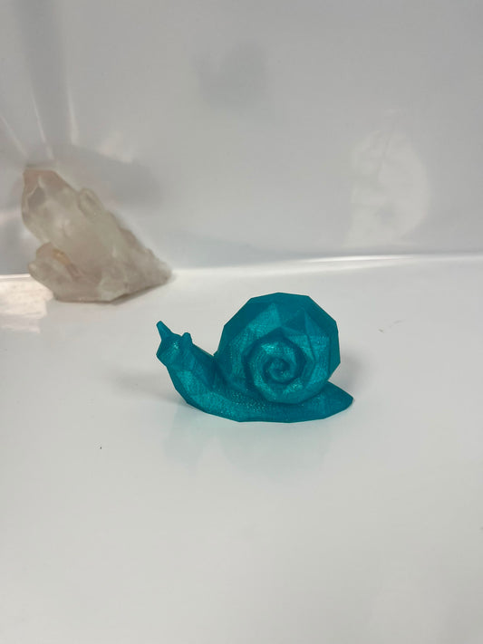 Geometrische Schnecke Figur Türkis Glitzer