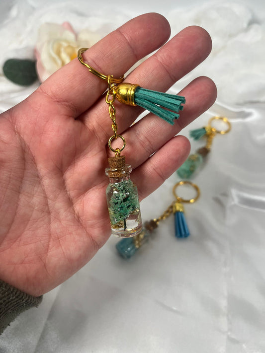 Schlüsselanhänger Blume in der Flasche Gold